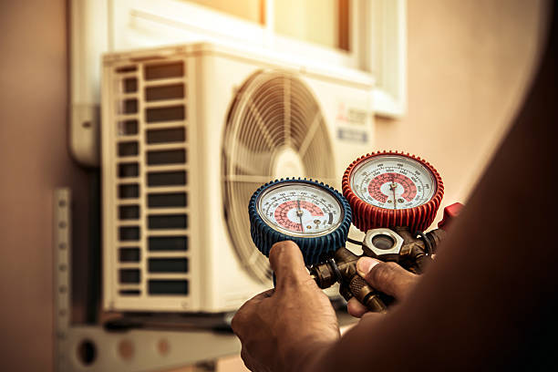 Professional Heat Pump Repair technician working in Buxton, OR